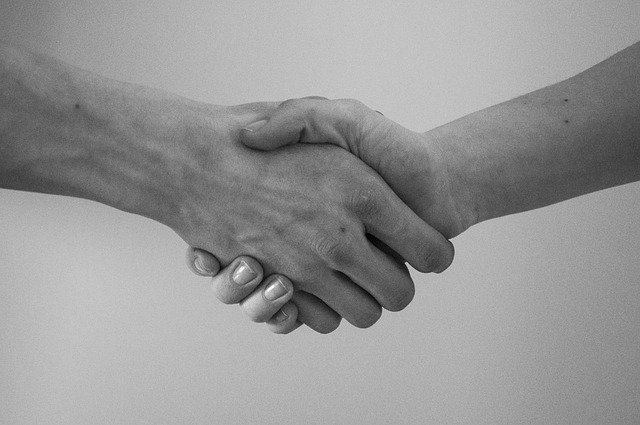 Handshake between contractor and homeowner